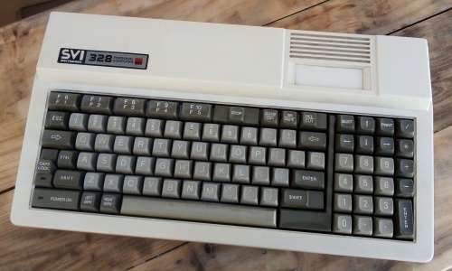 Spectravideo SV328 computer with cassette recorder and power supply.