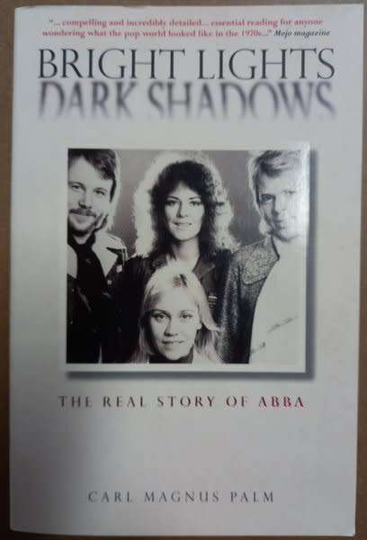 Bright Lights, Dark Shadows - The Real Story of ABBA (paperback) by Carl Magnus Palm