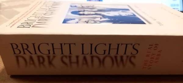 Bright Lights, Dark Shadows - The Real Story of ABBA (paperback) by Carl Magnus Palm