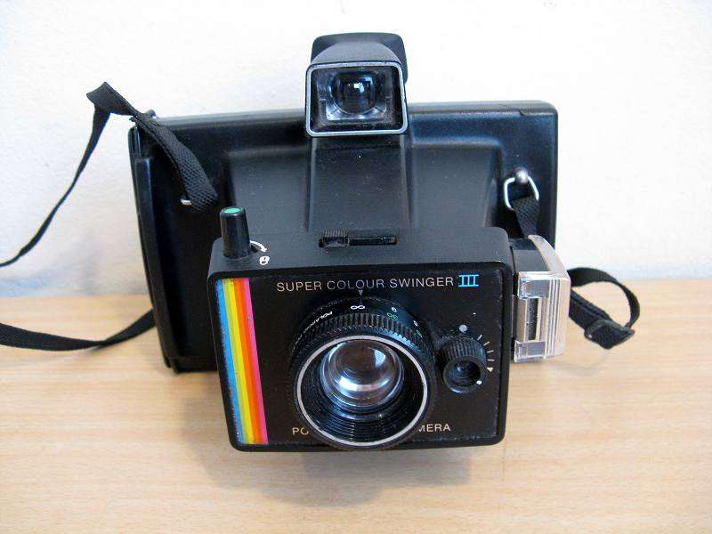 POLAROID LAND CAMERA.SUPER COLOUR SWINGER III.(CR39)