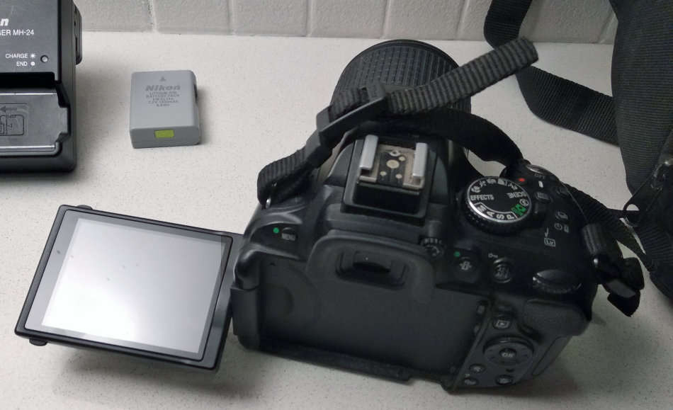 Nikon D5200 24 Megapixel Camera, With 55-200mm lens, SD Card, Vanguard Camera Backpack.