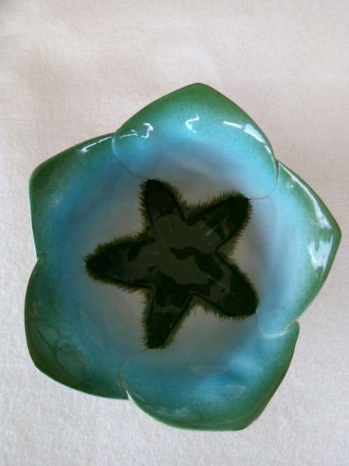 3 X SOUTH AFRICAN MOONSTONE AND MUSTARDSEED POTTERY PIECES - CUP,SAUCER & BOWL