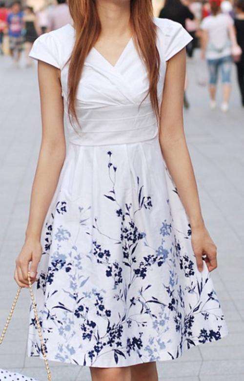 Ladies  white skirt with navy print   -    fit for size 30 and size 32