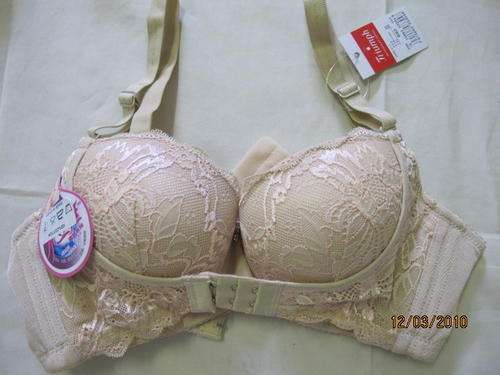 Triumph-Beige  magic bra  fit for  size 32  Cup A- B-- become cup C or D-ON SALE