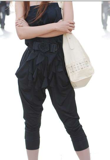 Black jumpsuit with front special stylings, waist elastic, size 32--36 -free size