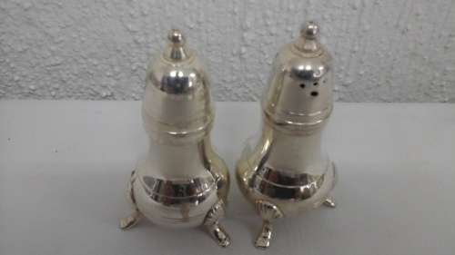 TOTALLY UNUSUAL THREE LEGGED EPNS SALT AND PEPPER CELLARS. TALL AND MAJESTIC