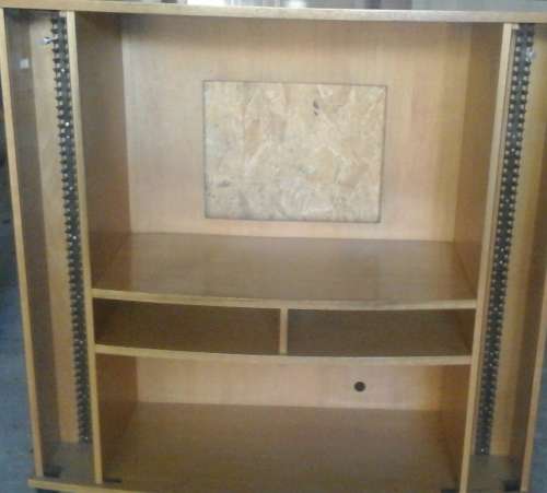 MAGNIFICENT WOODEN TV UNIT HAS PLACE FOR YOUR CD'S AS WELL AS SHELF SPACE. MAGNIFICENT