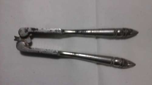 FANTASTIC VINTAGE PLATED NUT CRACKER. MARKED WITH AGE