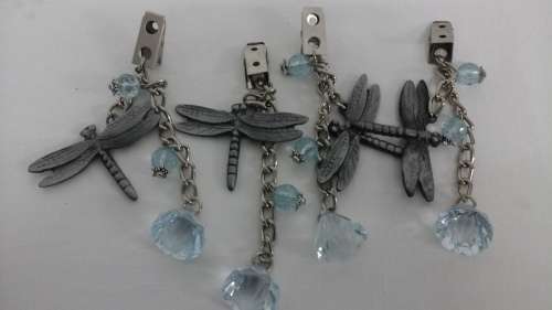 A SET OF FOUR ABSOLUTELY EXQUISITE DRAGONFLY TABLE CLOTH HOLDERS. FANTASTIC AND USEFUL PIECE!