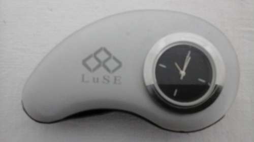 A SIMPLY STUNNING LuSE CAST ALUMINIUM CARD HOLDER AND DESK CLOCK. FANTASTIC COLLECTORS PIECE!