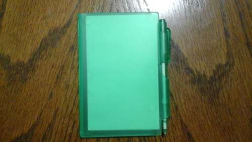 300 CUTE AND COMPACT A PRACTICAL PEN AND NOTEBOOK IN A PLASTIC HOLDER