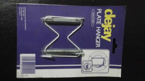 4 BRAND NEW WALL PLATE HANGERS. STILL SEALED