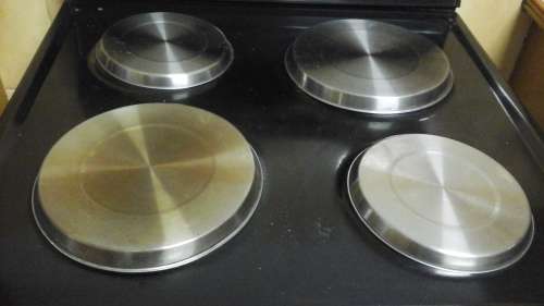 KEEP YOUR STOVE PLATES COVERED WITH THESE FOUR LOVELY STOVE PLATE COVERS
