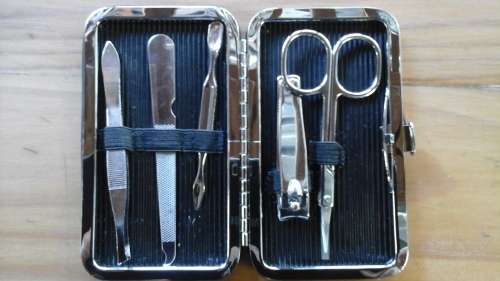 A MAGNIFICENT NAIL SET IN A BEAUTIFUL CASE. STILL IN ITS BOX MAKE A AWESOME GIFT