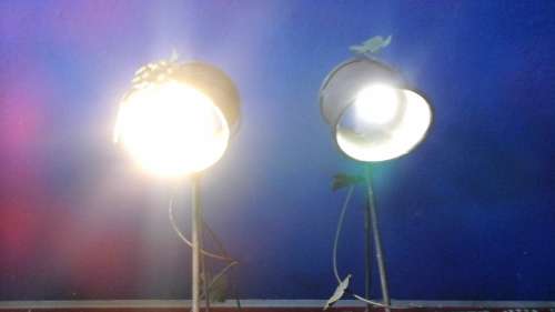 TWO BEAUTIFUL WROUGHT IRON WALL MOUNTED LIGHTS. GORGEOUS AND FUNCTIONAL!