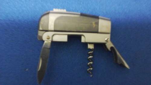 INCREDIBLE 4IN 1 MULTI TOOL. A LIGHTER, KNIFE, CORKSCREW AND BOTTLE OPENER. EXTREMLY HANDY!