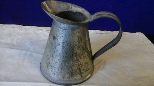 A VINTAGE GALVANISED STEEL LITTLE JUG MARKED 200 ML. HAS A COLLAR ON THE JUG .