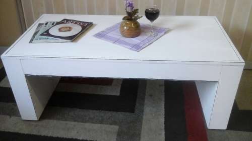 RECTANGULAR IN SHAPE.WHITE IN COLOUR.THIS COFFEE TABLE IS THE PERFECT COMPLEMENT TO ANY TASTE