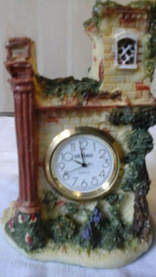 A SIMPLY STUNNING THE POLYSTONE COTTAGE QUARTZ MANTEL/ DESK CLOCK. STUNNING & FUNCTIONAL!