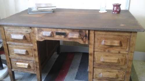 THIS MAGNIFICENT POSSIBLY PATRIDGE WOOD VINTAGE DESK IS A MUST HAVE.  SOLID PIECE