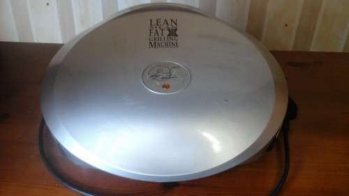 SLIM FOR SUMMER WITH MAGNIFICENT AND HEALTHY GEORGE FOREMAN GRILL. DRAINTHE FAT WHILE YOU COOK