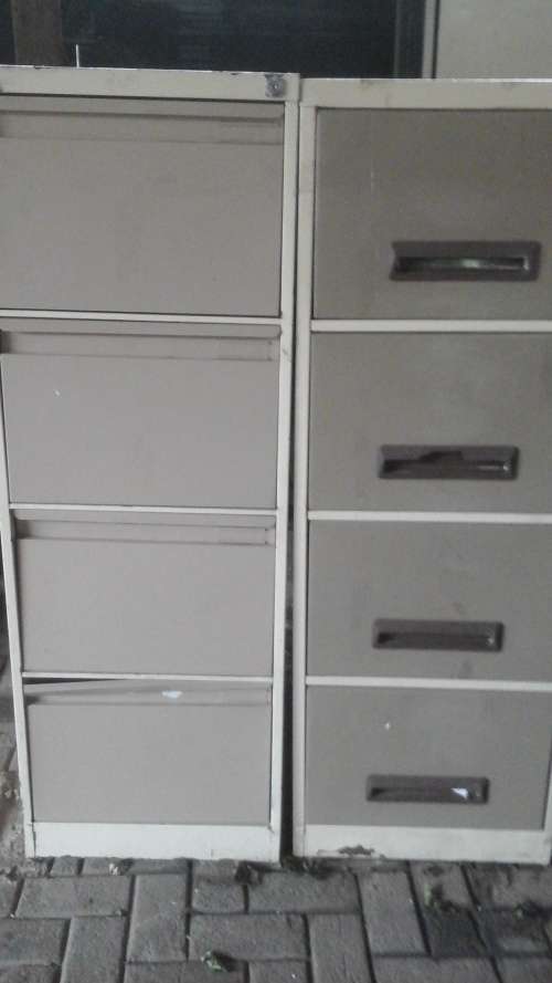TWO TERRIFIC STEEL FILING CABINETS/ DRAWERS. FOUR DRAWERS EACH. HANDY AND AWESOME!