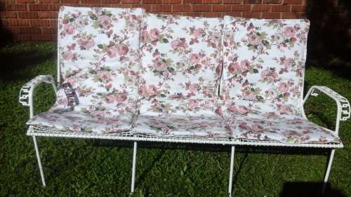 MAGNIFICENT AND UNUSUAL. A THREE SEATER VINTAGE WIRE GARDEN CHAIR. WOW!!!!!!PLUS BRAND NEW CUSHIONS