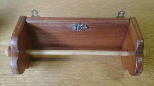 ABSOLUTELY WONDERFUL WOODEN PAPER TOWEL HOLDER. AWESOME AND USEFUL PIECE!