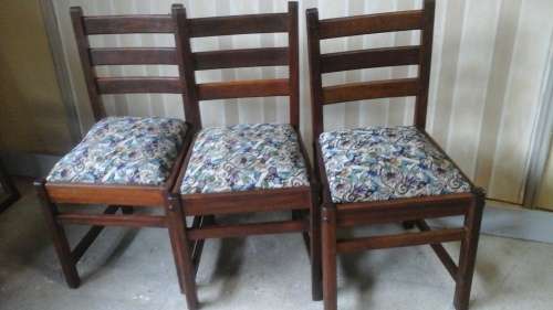 THREE MAGNIFICENT VINTAGE IMBUIA  LADDER BACK CHAIRS. ELEGANT AND STURDY!