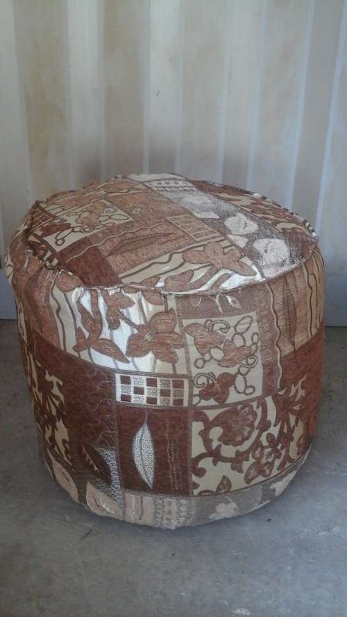 A STUNNING VINTAGE FOOTSTOOL/OTTOMAN. IN THE SEVENTIES THEY WHERE CALLED POOFS