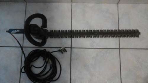 A FULLY FUNCTION BLACK AND DEKKER TREE SAW. AN ABSOLUTE NECESSITY WITH ALL THIS RAIN