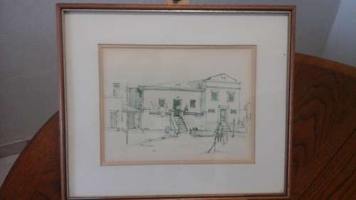 A VINTAGE PRINT OF A VILLAGE IN A BEAUTIFUL WOODEN FRAME BY TERRY NIEHAUS DATED  85