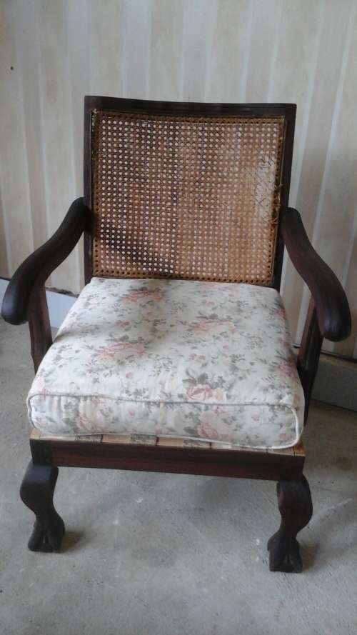 A MAGNIFICENT VINTAGE BALL AND CLAW IMBUIA ARM CHAIR. LOOKS LIKE THE ORIGINAL FABRIC ON THE CUSHION