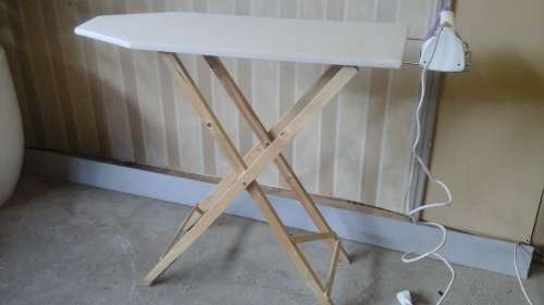 INCREDIBLE AND HANDY WOOD AND FABRIC IRONING BOARD. FABULOUS AND FUNCTIONAL!