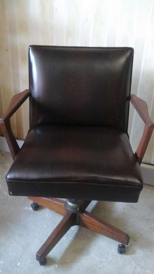 WOW A SUPERB AND CLASSY LOOKING POSSIBLY KIAAT AND LEATHER?? VINTAGE LAWYERS CHAIR.