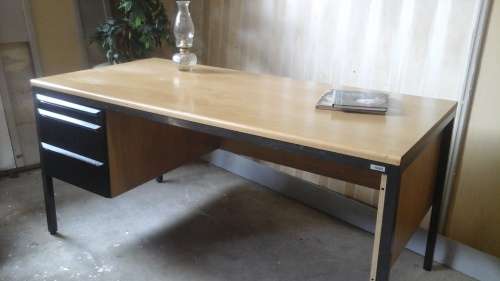 A FABULOUS OAK FINISH AND STEEL TRIM OFFICE DESK. PERFECT FOR A STUDY EVEN HAS TWO DRAWERS