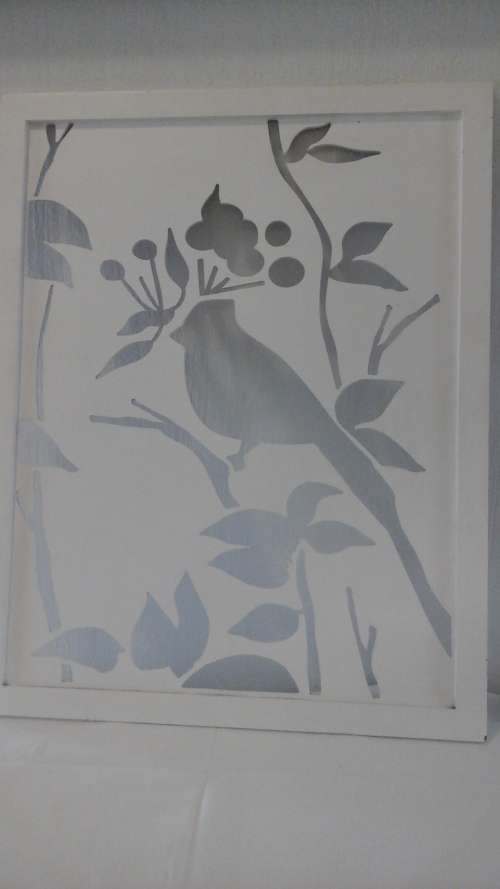 A LOVELY AND UNUSUAL WALL HANGING. BASICALLY JUST A CUT OUT OF A BIRD IN A TREE