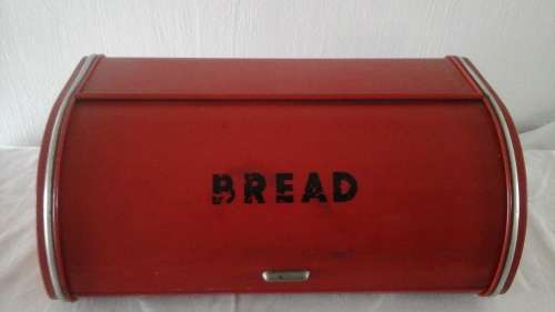 A MARVELLOUS VINTAGE RED BREAD BIN. EVEN SAYS BREAD. STILL USEFUL AND FUNCTIONAL