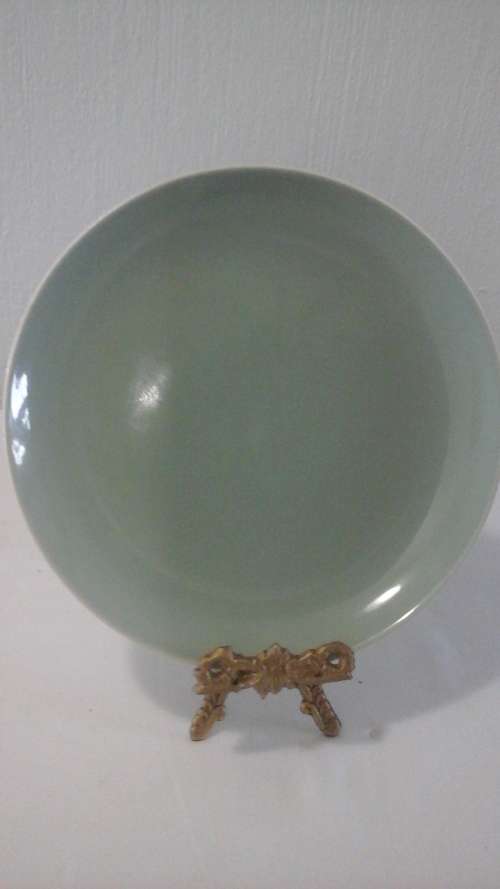 A CLASSY POOLE OF ENGLAND VINTAGE SIDE PLATE. GREEN IN COLOUR. USE IT AS A SPARE OR MIX AND MATCH