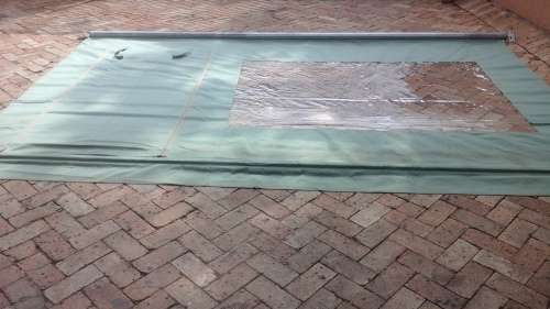 AWESOME ROLL UP BLIND WITH A WINDOW AND A DOOR. FANTASTIC AND USEFUL PIECE!