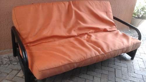 VERY VERSATILE AND USEFUL.A COUCH IN THE DAY AND A BED AT NIGHT.IF YOU DONT LIKE ORANGE RECOVER.