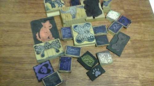 A FANTASTIC ASSORTMENT OF TWENTY TWO  WOODEN ANIMAL STAMPS. AWESOME SET!