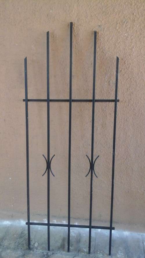 KEEP YOUR HOME SECURE. FANTASTIC SPANISH STYLE BURGLAR BAR. GIVE YOU SLIGHT MORE PEACE OF MIND!