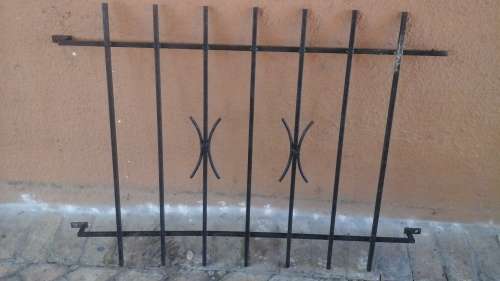KEEP YOUR HOME SECURE. FANTASTIC SPANISH STYLE BURGLAR BAR. GIVE YOU SLIGHT MORE PEACE OF MIND!
