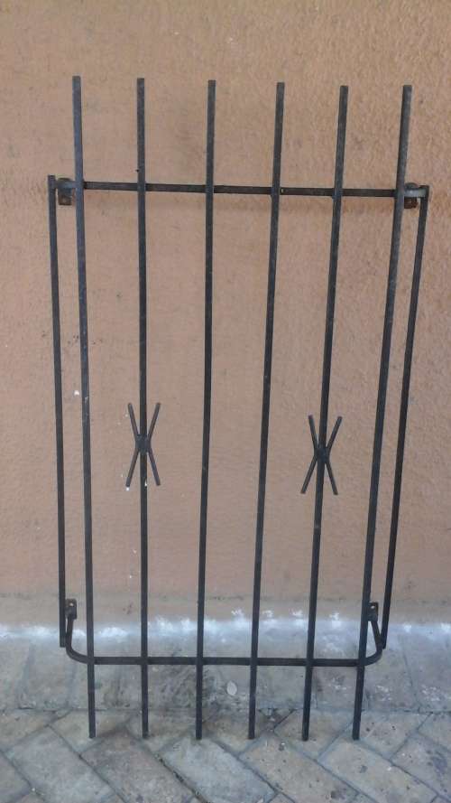 KEEP YOUR HOME SECURE. FANTASTIC SPANISH STYLE BURGLAR BAR. GIVE YOU SLIGHT MORE PEACE OF MIND!