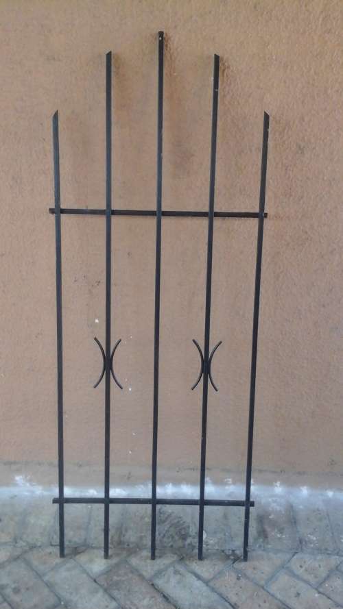 KEEP YOUR HOME SECURE. FANTASTIC SPANISH STYLE BURGLAR BAR. GIVE YOU SLIGHT MORE PEACE OF MIND!