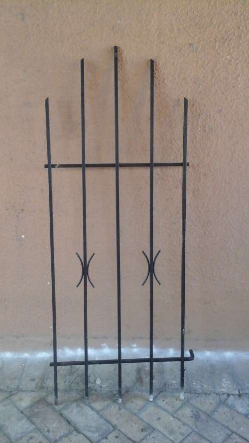 KEEP YOUR HOME SECURE. FANTASTIC SPANISH STYLE BURGLAR BAR. GIVE YOU SLIGHT MORE PEACE OF MIND!