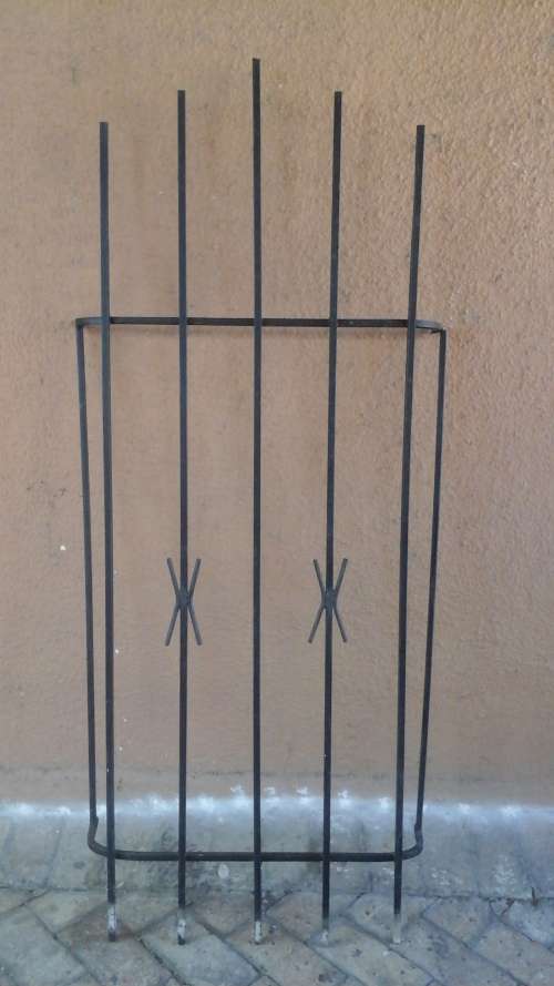 KEEP YOUR HOME SECURE. FANTASTIC SPANISH STYLE BURGLAR BAR. GIVE YOU SLIGHT MORE PEACE OF MIND!