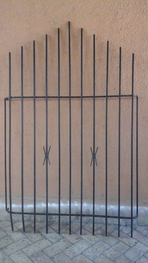 KEEP YOUR HOME SECURE. FANTASTIC SPANISH STYLE BURGLAR BAR. GIVE YOU SLIGHT MORE PEACE OF MIND!