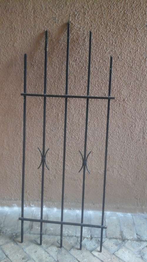 KEEP YOUR HOME SECURE. FANTASTIC SPANISH STYLE BURGLAR BAR. GIVE YOU SLIGHT MORE PEACE OF MIND!